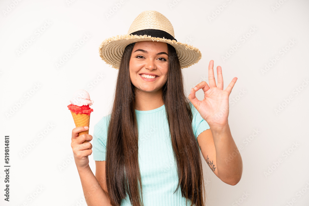 Wall mural hispanic pretty woma making capice or money gesture, telling you to pay. ice cream and summer concep