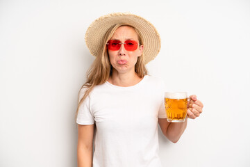 pretty caucasian woman feeling sad and whiney with an unhappy look and crying. beer pint concept