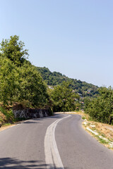 Fototapeta na wymiar Road to the mountains near the village (Pelion, Magnesia, Greece)