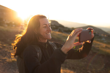 girl taking pictures on the phone