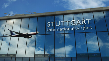 Airplane landing at Stuttgart Germany airport mirrored in terminal