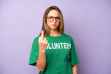 pretty caucasian woman feeling angry, annoyed, rebellious and aggressive. volunteer concept