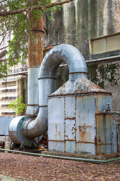 Close-up of outdoor incinerator blower in old dilapidated factory