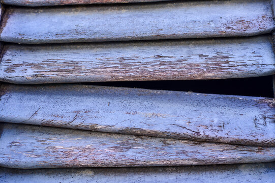 Wood texture. Pieces of old window under parallel lines.