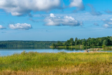 Beautiful summer day in Swedish landscape of Segersgarde nature reservation. Green forests, meadows view from the top of the rock. Summer holiday in Sweden. Brackish waters of gulf of Bothnia. © Petr