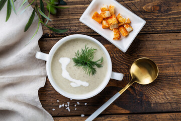 mushroom soup in a white bowl,  view from above. copy space