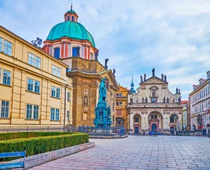 Fotobehang The dome of St Francis of Assisi Church and facade of St Salvator Church, Prague, Czech Republic © efesenko