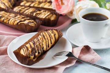 Traditional french eclairs with chocolate.