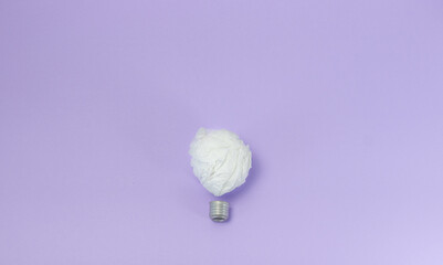 paper lightbulb on very peri background