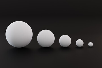 Five white balls of different sizes. balls of different sizes on a black background. the concept of growth in anything. profit increase. Horizontal image. 3d render illustration.