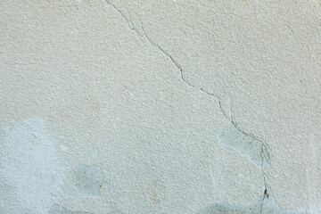 White grunge old concrete stucco wall texture background. Abstract weathered gray cement cracked building wall background
