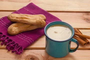 Fotobehang (Atol de elote) the traditional drink of Guatemala, made of corn and cinnamon. © SALMONNEGRO