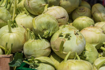 Healthy vegetables. Green kohlrabi is on the counter at the market.