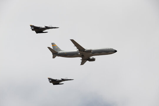 BOGOTA, COLOMBIA - JULY 20 OF 2022  Closeup to a Boeing 767 and two Kfir airplanes flying during colombian independence day celebration parade. 