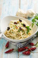 Pasta with cauliflower black olives and hot chili pepper