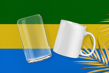 Patriotic can glass and mug mock up on background in colors of national flag. Gabon