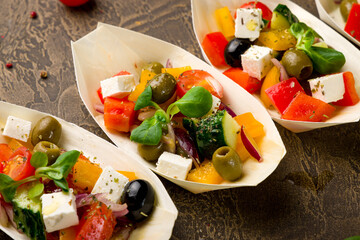 Greek salad with feta cheese and vegetables, canapes