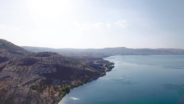 Aerial view of water reservoir on Euphrates river near the ruins of the ancient city of Zeugma. Border of Gaziantep and Sanliurfa provinces, Turkiye