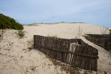 Sand dunes and a fence, Sardinia, Italy