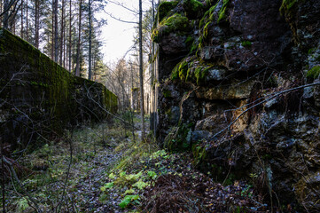 Passage through a granite rock. concrete structure. Passage to the powder cellar.