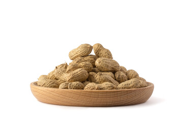 unpeeled peanuts in a tray, isolated on white background