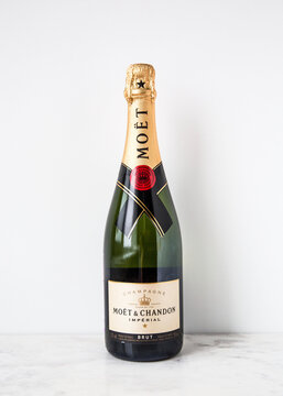 MOSCOW, RUSSIA - DECEMBER 10, 2018: Mo&euml;t & Chandon Imperial Champagne Bottle on White Wall Background. Product of France.