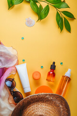 Set of accessories for sun protection on the beach in summer and on vacation, cosmetics, SPF cream
