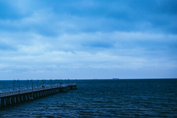 Fototapeta na wymiar pier and the blue sea