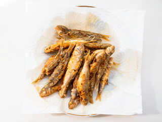 top view of portion fried small red mullet fishes