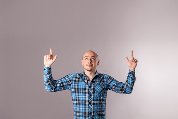 usual man staying with hands up