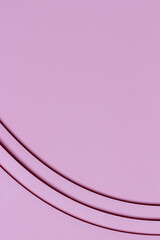 Abstract colored paper texture background. Minimal geometric shapes and lines in pastel purple color