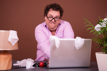Funny fat man watching adult video.