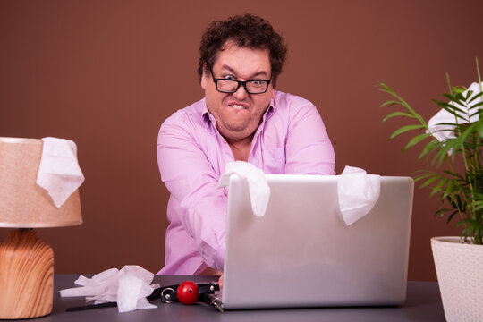 Funny fat man watching adult video.
