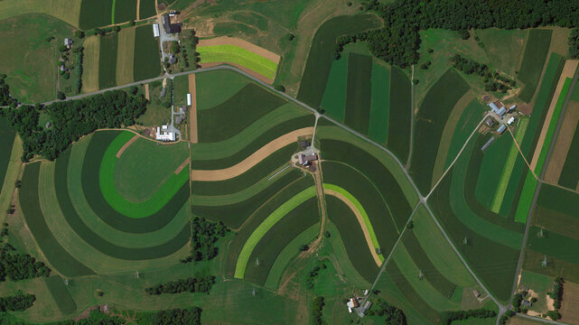 Colorful fields bird's eye view, cultivated fields looking down aerial view from above, Pennsylvania, USA