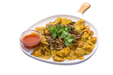 Orh luak with chilli sauce served in a dish isolated on plain white background side view of Orh Luak Carrot Cake
