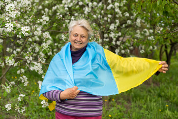 elderly woman with the flag of ukraine