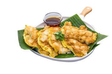 Carrot Cake with Mala Chilli Dipping Sauce served in a dish isolated on plain white background side view of Orh Luak Carrot Cake
