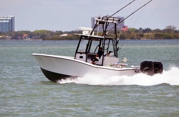 Sport fishing boat powered by two outboard engines
