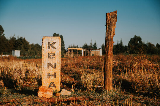 Kenha tittle on the Kenya border. Kenya inscription in local language, border point in East African country. Visiting Kenya or hiking in Kenya, illustration photo