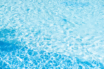 Fototapeta na wymiar surface of blue swimming pool, background of water in swimming pool.