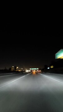 Night driving vertical time lapse on the Golden State and Hollywood Freeways in Los Angeles.