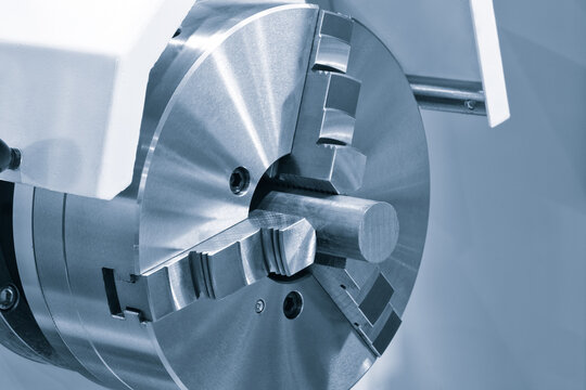 Manufacturing CNC professional lathe machine. Industrial concept. Close-up, industrial metalworking concept