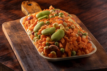 Tray of different peasant vegetables beans-carrot-peas-carrot- carrot-curly corn
