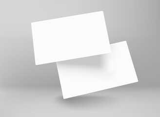 Two blank white business cards in perspective. 3d vector mockup for branding