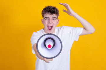 isolated young man with megaphone