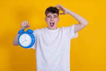 isolated young man with clock
