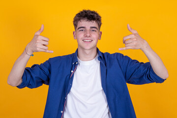 happy young man isolated on color background