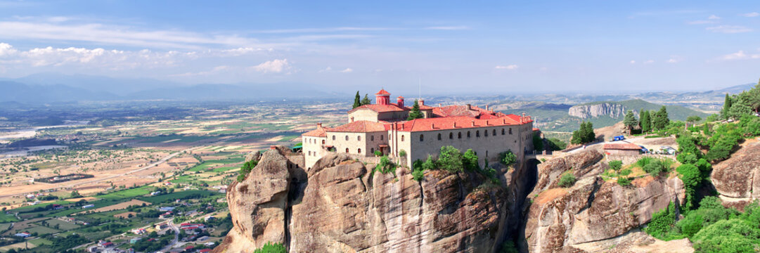 Stone monastery in the mountains. Kalabaka, Greece summer cloudy day in Meteora mountain valley. panoramic photo close up © valeri
