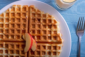 Apple waffle with slices of gala apple garnish