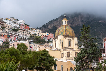 Fototapeta na wymiar Cupola of the church Santa Maria Assunta in Positano, Amalfi coast of Italy